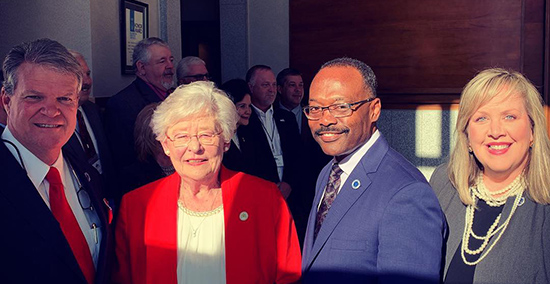 Commissioners with Gov Ivey